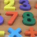Šareni brojevi drvena igra za slaganje oblika 30x22cm